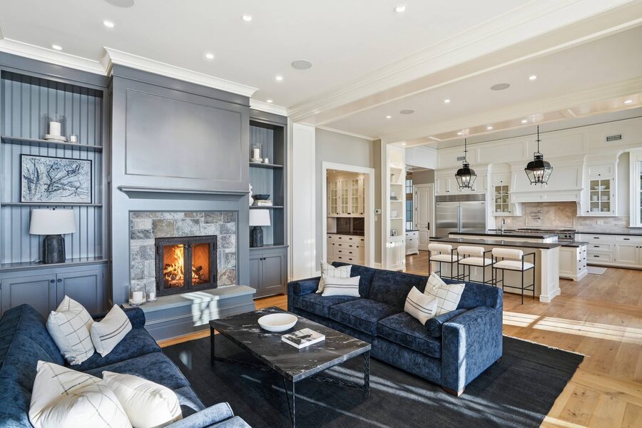 Marble fireplace with dark built-ins