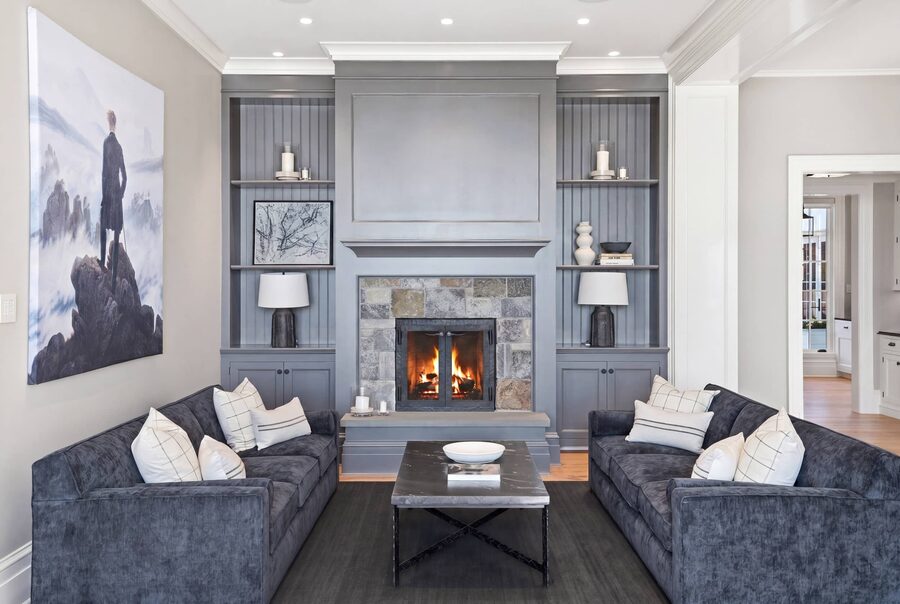 Grey living, marble fireplace, artwork