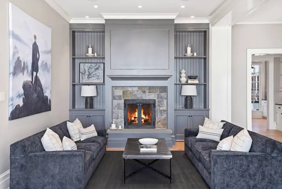 Grey living, marble fireplace, artwork